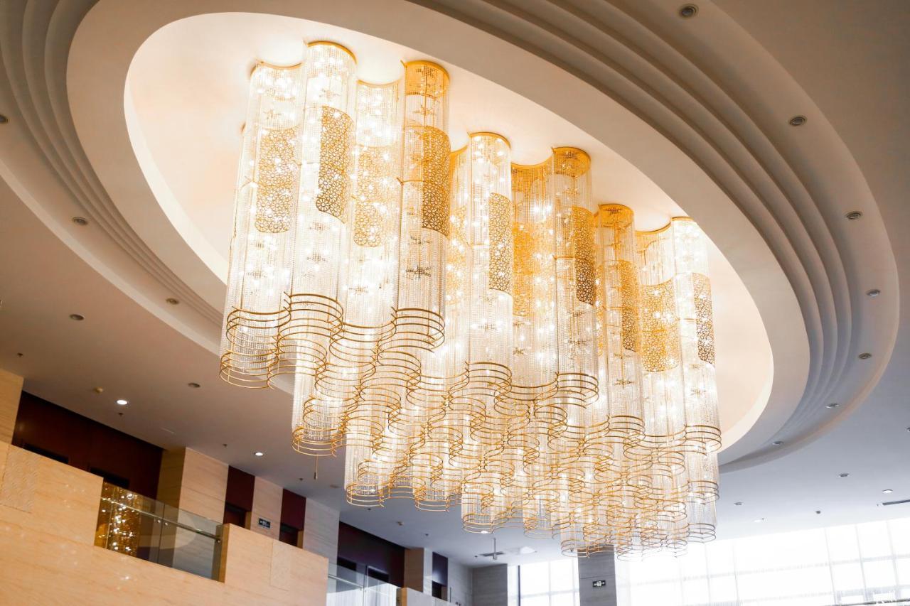 Пекин Палас Soluxe Hotel Astana Экстерьер фото The chandelier at the lobby of the Ritz-Carlton, Dubai