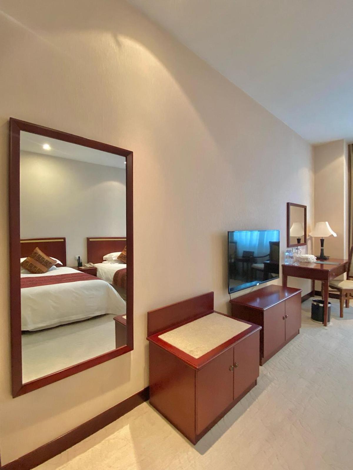 Пекин Палас Soluxe Hotel Astana Экстерьер фото A room at the hotel