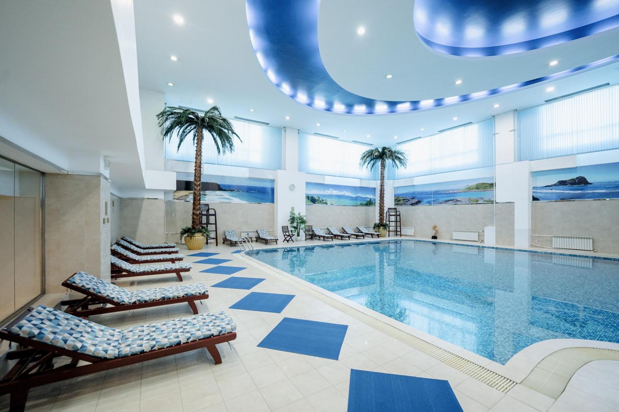 Пекин Палас Soluxe Hotel Astana Экстерьер фото The swimming pool at the hotel