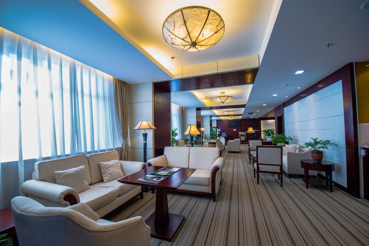 Пекин Палас Soluxe Hotel Astana Экстерьер фото The lounge at Beijing Capital International Airport